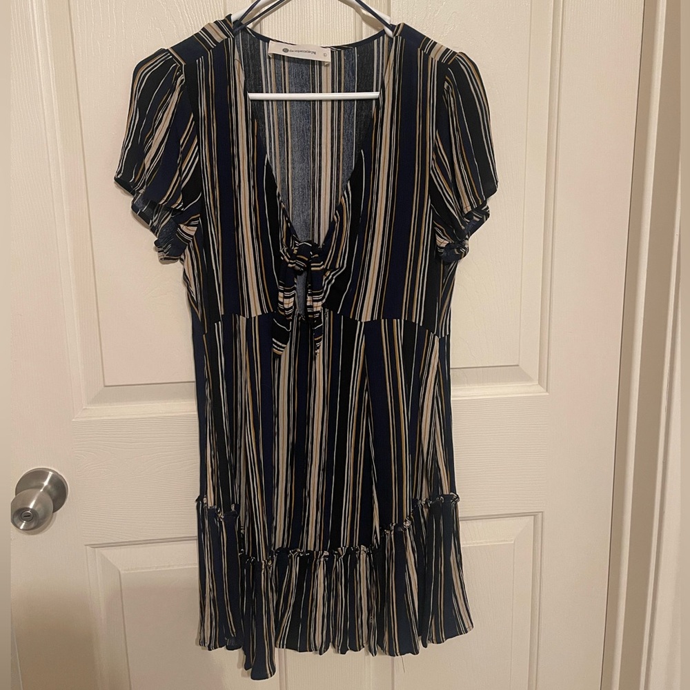 Dark blue dress with gold and beige stripes